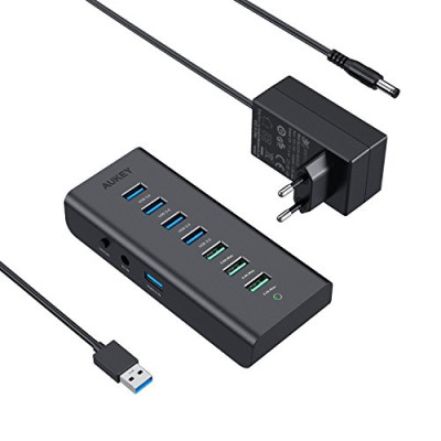 AUKEY – Hub USB 4 Puertos USB 3.0 y 3 Puertos de Carga con Adaptador de Corriente 36W Hub USB 3.0 para Windows XP/Vista / 7/8, Mac OS, Linux, etc.